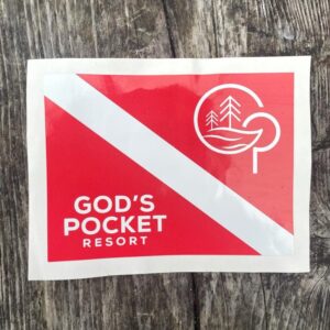 Die cast sticker with red and white dive flag and Gods Pocket Logo in corner