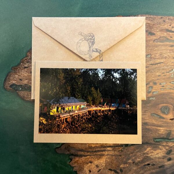 A handmade card with a photograph of God's Pocket viewing deck lit up by the sun.